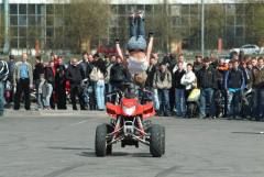 quad gets pavement, rider gets air